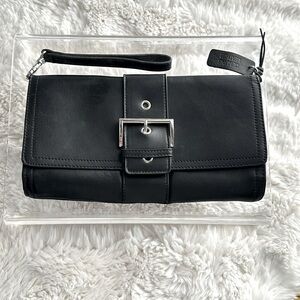 Black Leather Rolf”s clutch